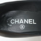Chanel cap-toe platform pumps in black leather & patent, size 35.5, authentic pre-owned with light wear