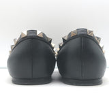 Valentino Noir Rockstud pointed-toe ballet flats in black leather, pre-owned with authentic designer detailing.