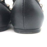 Authentic Valentino Noir Rockstud pointed-toe black leather ballet flats, pre-owned with tasteful wear