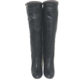Authentic Chanel CC chain-trim cap-toe knee-high boots in black leather, pre-owned luxury