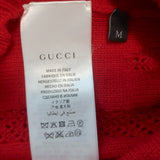 Authentic pre-owned Gucci ruffled pointelle knit short-sleeve sweater in red wool, size M — gently worn luxury.