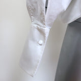 Khaite Brianne puff-sleeve button-down shirt in white poplin, authentic pre-owned and gently worn luxury piece