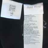 Here are three alt tag options (each under 125 characters): 1. Miu Miu bicolor cady mini dress with crochet collar and puff sleeves in black and white — authentic pre-owned luxury. 2. Pre-owned Miu Miu black-and-white cady mini dress with crochet collar and sculpted puff sleeves — authentic luxury. 3. Pre-owned Miu Miu bicolor cady mini dress in black and white with handcrafted crochet collar and puff sleeves.