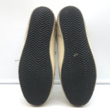 Golden Goose Superstar glitter-star sneakers in white leather with silver accents, authentic pre-owned luxury.