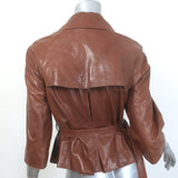 Authentic Burberry London belted brown leather short trench jacket, size US 4, gently pre-owned.