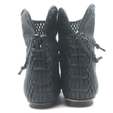 Authentic Chanel cap-toe perforated leather flat ankle boots in black, gently pre-owned (EU 38 / US 7.5)