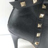 Valentino Rockstud bow ankle boots in black leather, authentic pre-owned designer footwear