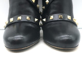 Valentino Rockstud bow ankle boots in black leather, pre-owned luxury designer boots with authentic stud detailing