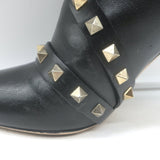 Valentino bow ankle boots in black leather with Rockstud accents, pre-owned with authentic luxury wear