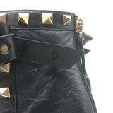 Authentic pre-owned Valentino Rockstud bow ankle boots in black leather, elegant yet gently worn