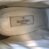 Valentino Rockstud bow ankle boots in black leather — pre-owned, authentic designer with character