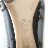 Valentino Rockstud bow ankle boots in black leather, pre-owned with authentic designer studs and light visible wear