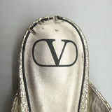 Valentino Unchateau flat bow mules in gold metallic cracked leather, pre-owned and authentic, EU 38.5