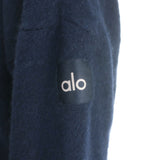 Authentic pre-owned Alo Yoga cashmere V-neck sweater and flared pants set in navy, gently worn.