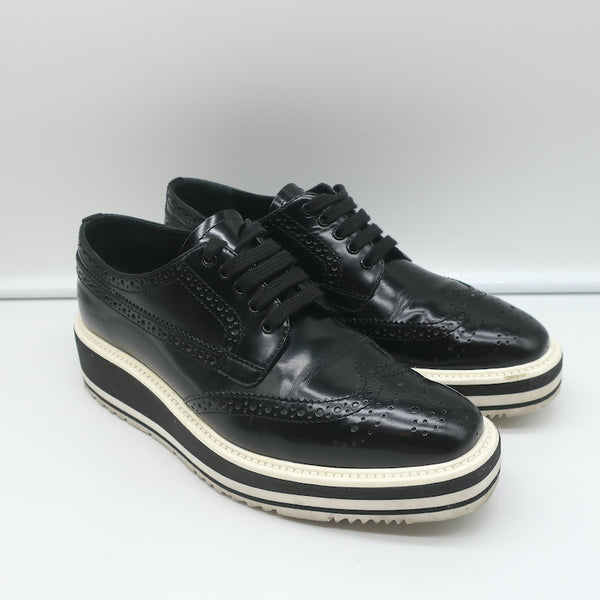 Prada Wingtip Brogue Platform Sneakers Black Spazzolato Leather