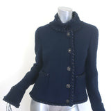 Chanel navy wool tweed jacket with CC star button and metallic trim, fringed detailing — pre-owned, authentic