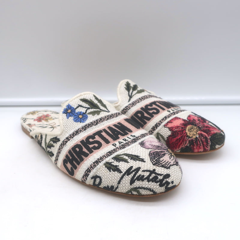 Christian Dior floral-embroidered canvas flat mules in white with multicolored embroidery, authentic pre-owned, gently worn