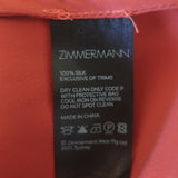 Zimmermann pre-owned crimson silk satin long-sleeve mini wrap dress with tie waist and V-neck, lightly worn.