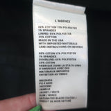 L'Agence coated denim jacket in black stretch cotton, authentic luxury pre-owned piece with gently worn character