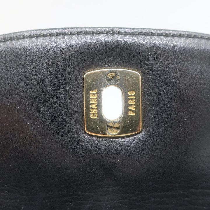 Vintage Chanel CC Turnlock Chain-Trimmed Quilted Mini Belt Bag Black Leather