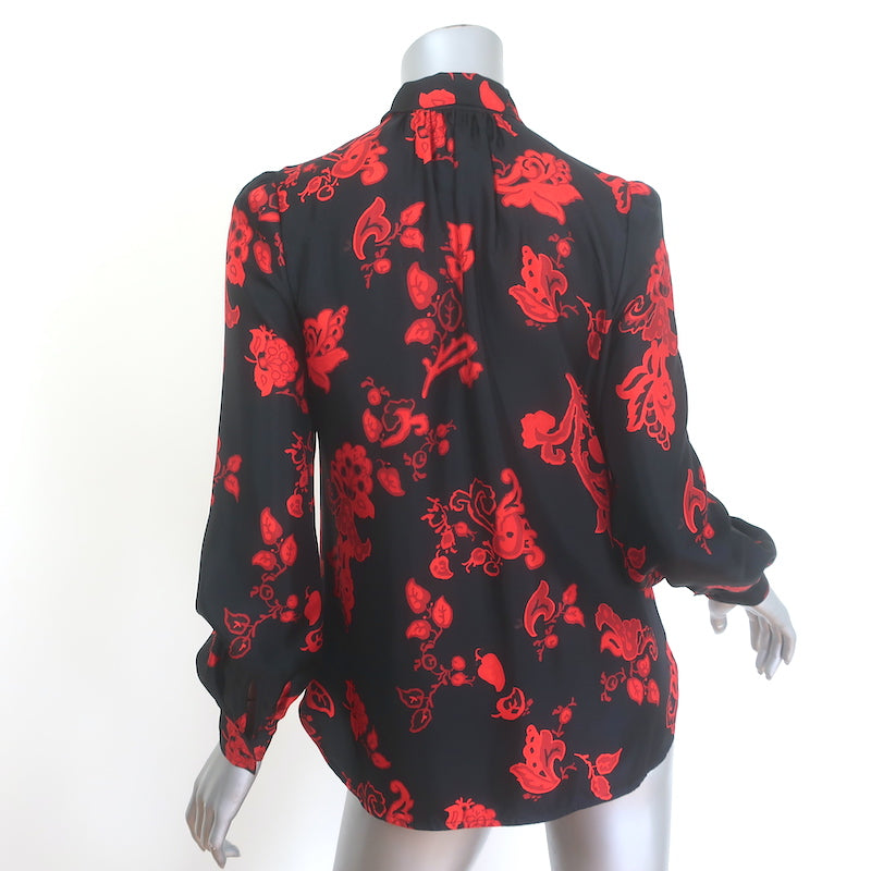 Tory Burch silk bow blouse in black with red paisley print, size 2, pre-owned luxury piece, gently worn