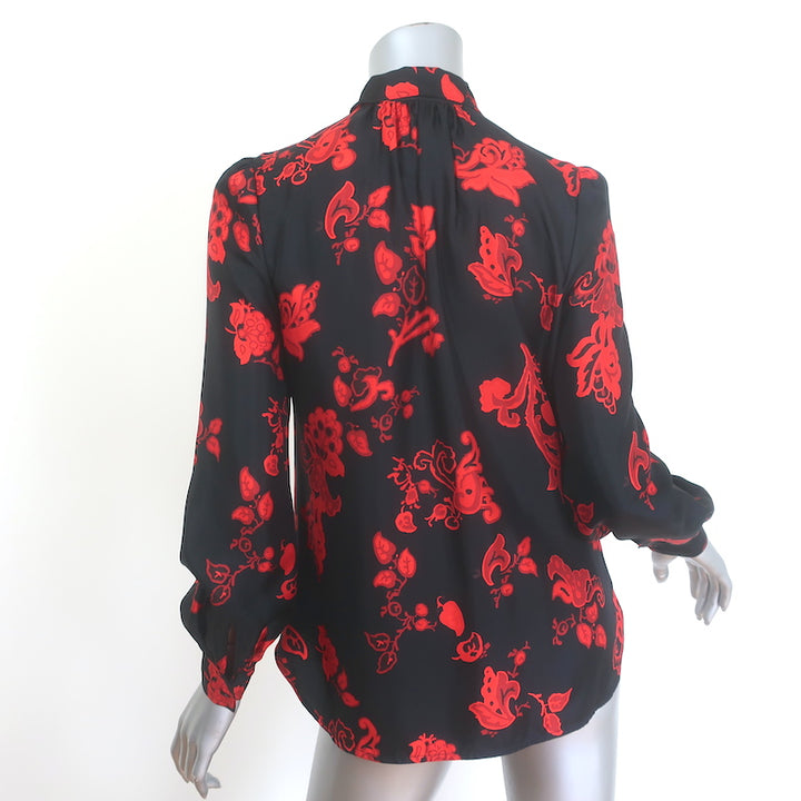 Tory Burch silk bow blouse in black with red paisley print, size 2, pre-owned luxury piece, gently worn