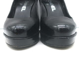Chanel cap-toe platform pumps in black leather and patent, authentic pre-owned luxury heels