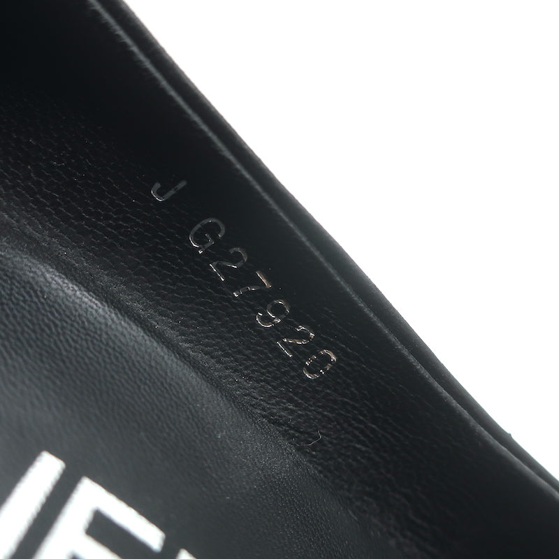 Chanel cap-toe platform pumps in black leather and patent, size 35.5 — pre-owned, authentic luxury with gentle wear.