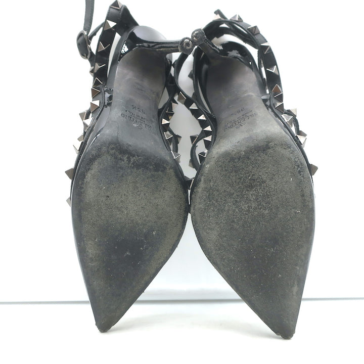 Valentino Rockstud T-strap pointed-toe pumps in black patent leather, pre-owned, authentic luxury, lightly worn.