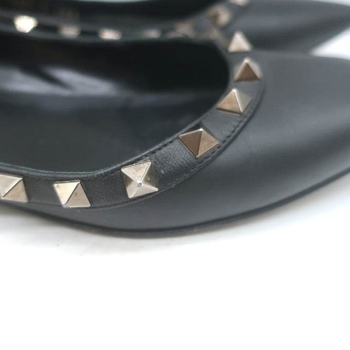 Valentino Rockstud pointed-toe ballet flats in black leather, pre-owned with light wear and authentic designer hardware.
