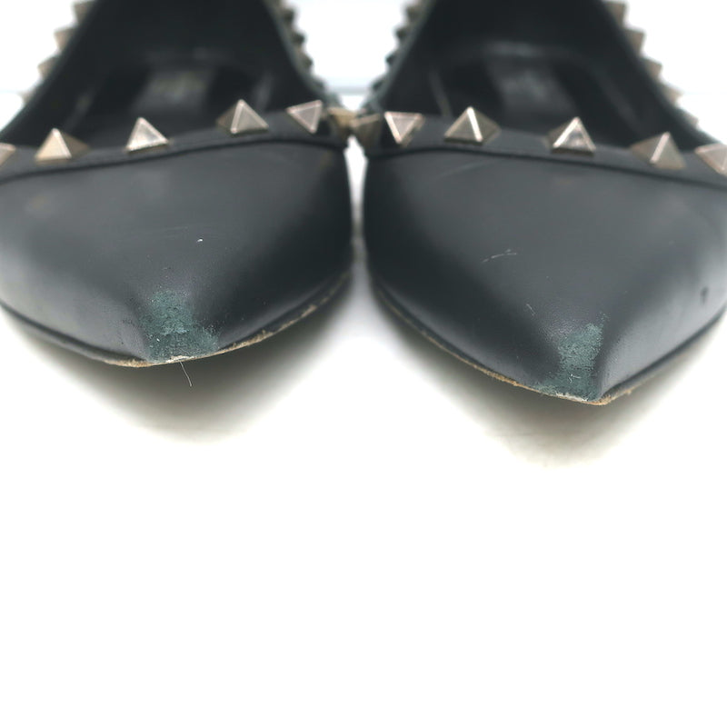 Authentic Valentino Noir Rockstud pointed-toe ballet flats in black leather, pre-owned with light wear.