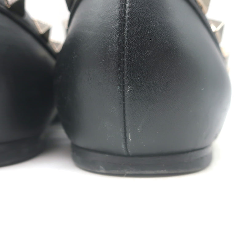 Authentic Valentino Noir Rockstud pointed-toe black leather ballet flats, pre-owned with tasteful wear