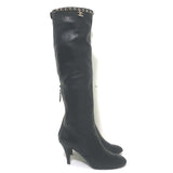 Chanel pre-owned black leather CC chain-trim cap-toe knee-high boots, authentic luxury with gentle wear