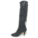 Chanel knee-high cap-toe boots in black leather with CC chain trim, pre-owned luxury