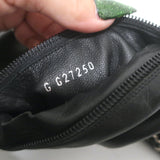 Chanel cap-toe knee-high boots in black leather with CC chain trim, authentic pre-owned designer pair