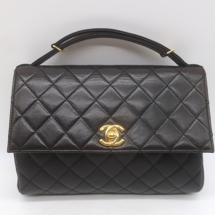 Vintage 1997 Chanel CC Turn-Lock Top Handle Quilted Flap Bag Black Leather