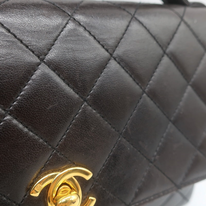 Vintage 1997 Chanel CC Turn-Lock Top Handle Quilted Flap Bag Black Leather