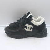 Chanel 10B CC low-top sneakers in black mesh and leather, pre-owned with light wear, authentic designer, size 36