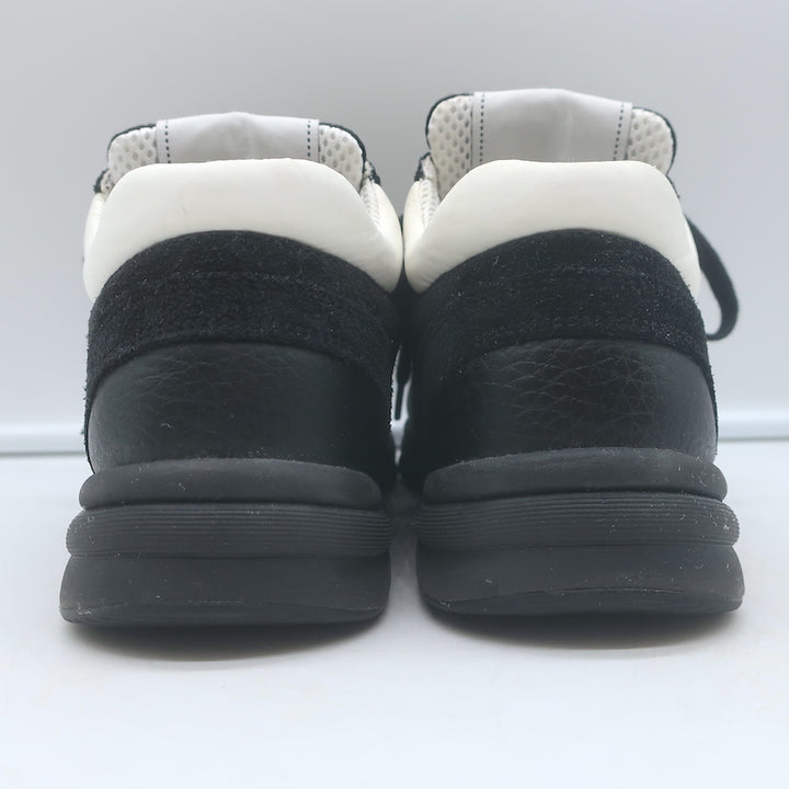 Authentic pre-owned Chanel 10B CC low-top sneakers in black mesh and leather, size 36