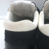 Chanel 10B CC low-top sneakers in black mesh and leather, pre-owned with authentic designer details