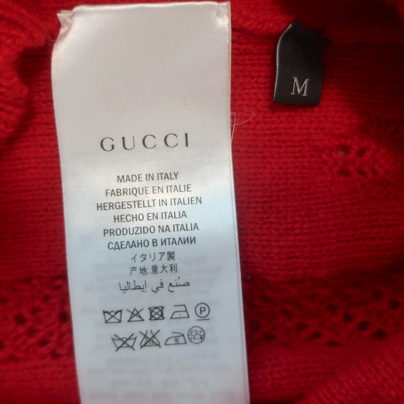 Authentic pre-owned Gucci ruffled pointelle knit short-sleeve sweater in red wool, size M — gently worn luxury.