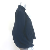 Veronica Beard pleated navy blouse with blouson sleeves, size 2, authentic pre-owned with refined tailoring.