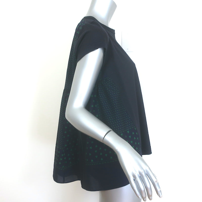 Sacai Luck tiered-back cap-sleeve tee in black linen-blend with heart print — pre-owned, gently worn luxury piece