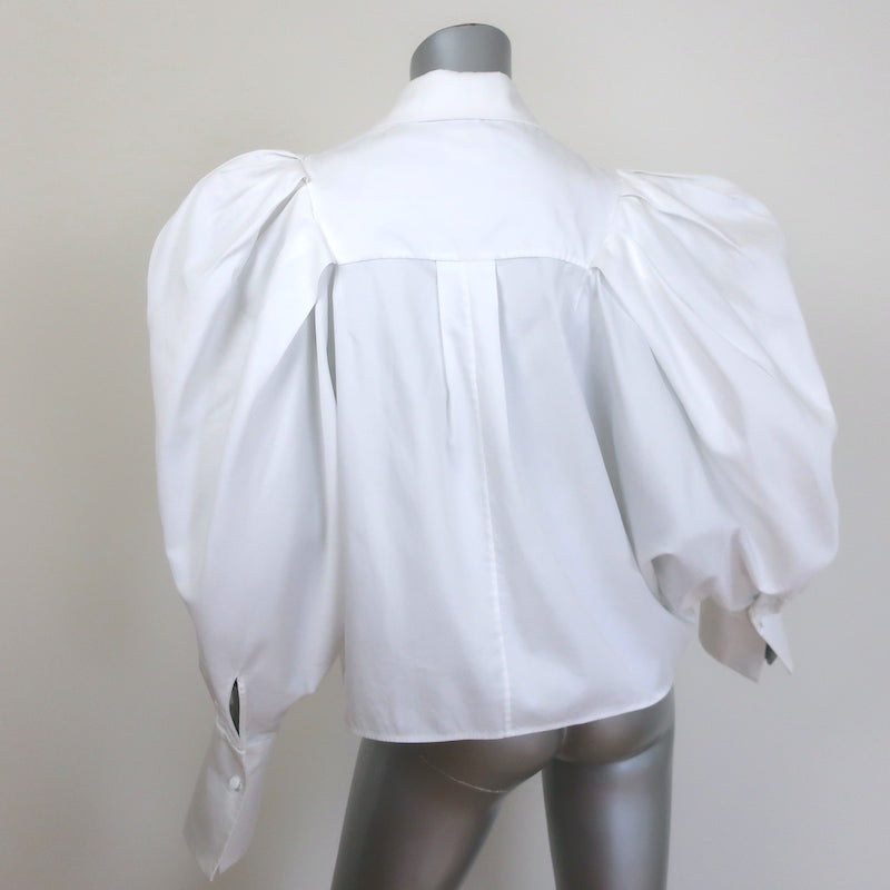 Khaite Brianne puff-sleeve button-down shirt in white poplin, authentic pre-owned, gently worn luxury piece.