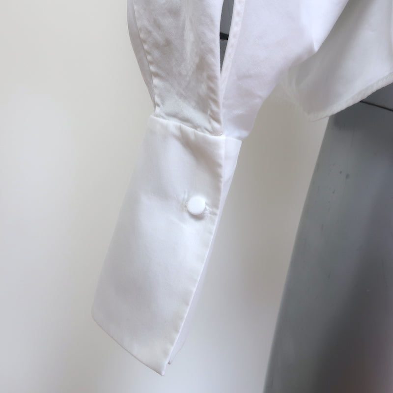 Khaite Brianne puff-sleeve button-down shirt in white poplin, authentic pre-owned and gently worn luxury piece