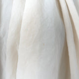 Authentic pre-owned Khaite Alma puff-sleeve gathered blouson top, ivory silk-blend, size 4, luxury designer piece.