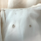 Khaite Alma puff-sleeve gathered blouson top in ivory silk-blend, pre-owned size 4, authentic luxury resale.