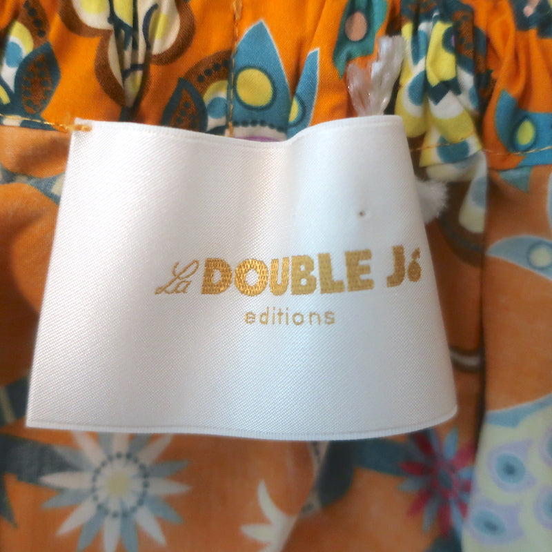 La DoubleJ Paloma off-shoulder printed poplin top in orange — authentic, gently pre-owned designer piece