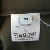 Givenchy olive silk draped twist-neck blouse, long sleeve size 38 — pre-owned, gently worn luxury piece.