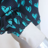 Fendi cold-shoulder button-up blouse in navy silk, Heart of Hearts motif, authentic pre-owned, size US 2